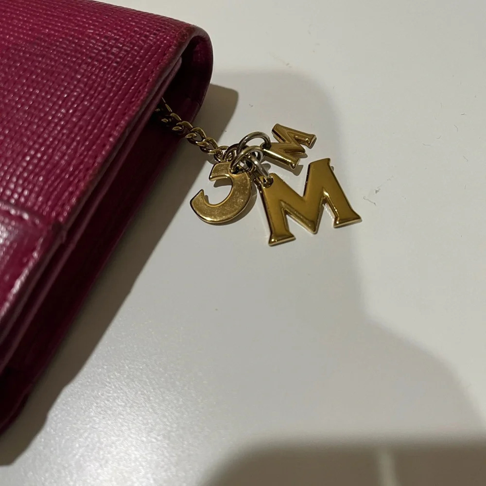 MCM DARK PINK TRIFOLD WALLET WITH MCM CHARM - Picture 3 of 15